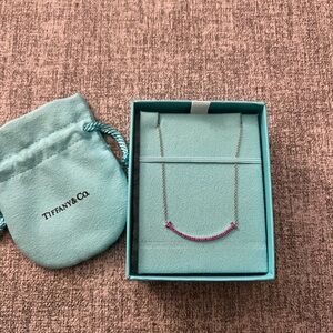 Tiffany & Co. White gold and Pink Sapphire T-Smile Necklace